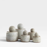 JONES + CO hand-thrown alabaster stoneware stash jars with matte glaze and chunky knobs. Set of 6.