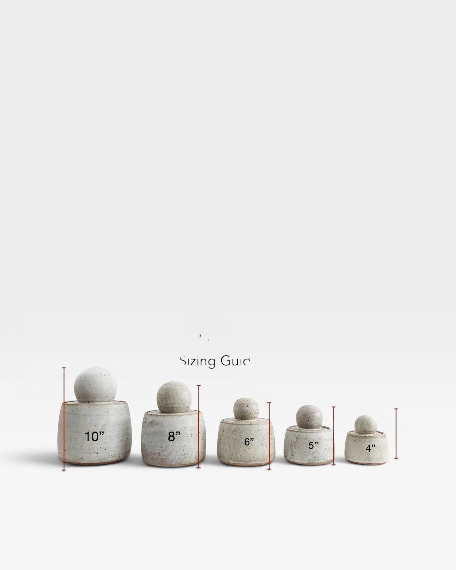 JONES + CO alabaster stoneware stash jars with chunky knobs, shown in 5 sizes from 4" to 10".