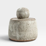 JONES + CO hand-thrown alabaster stoneware stash jar with a matte glaze and chunky knob lid.