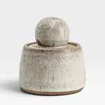 JONES + CO alabaster stoneware stash jar with a chunky knob lid and matte glaze finish.