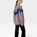 JONES + CO fleecy alpaca blend raglan pullover in lavender with a blue graphic intarsia pattern on the upper body.