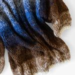 JONES + CO oversized alpaca cardigan in a kingfisher blue and brown ombre knit with a soft, textured finish.