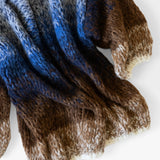 JONES + CO oversized alpaca cardigan in a kingfisher blue and brown ombre knit with a soft, textured finish.