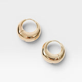 JONES + CO Alpha Hoop small chunky tapered huggie earrings in 12k gold-plated brass with hinge detail.