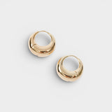 JONES + CO Alpha Hoop small chunky tapered huggie earrings in 12k gold-plated brass with hinge detail.