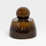 JONES + CO amber glazed stoneware stash jar with a chunky knob. Hand-thrown in Los Angeles.