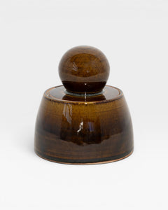 JONES + CO amber glazed stoneware stash jar with a chunky knob. Hand-thrown in Los Angeles.