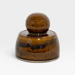 JONES + CO hand-thrown amber stoneware stash jar with a chunky knob and satin glaze.