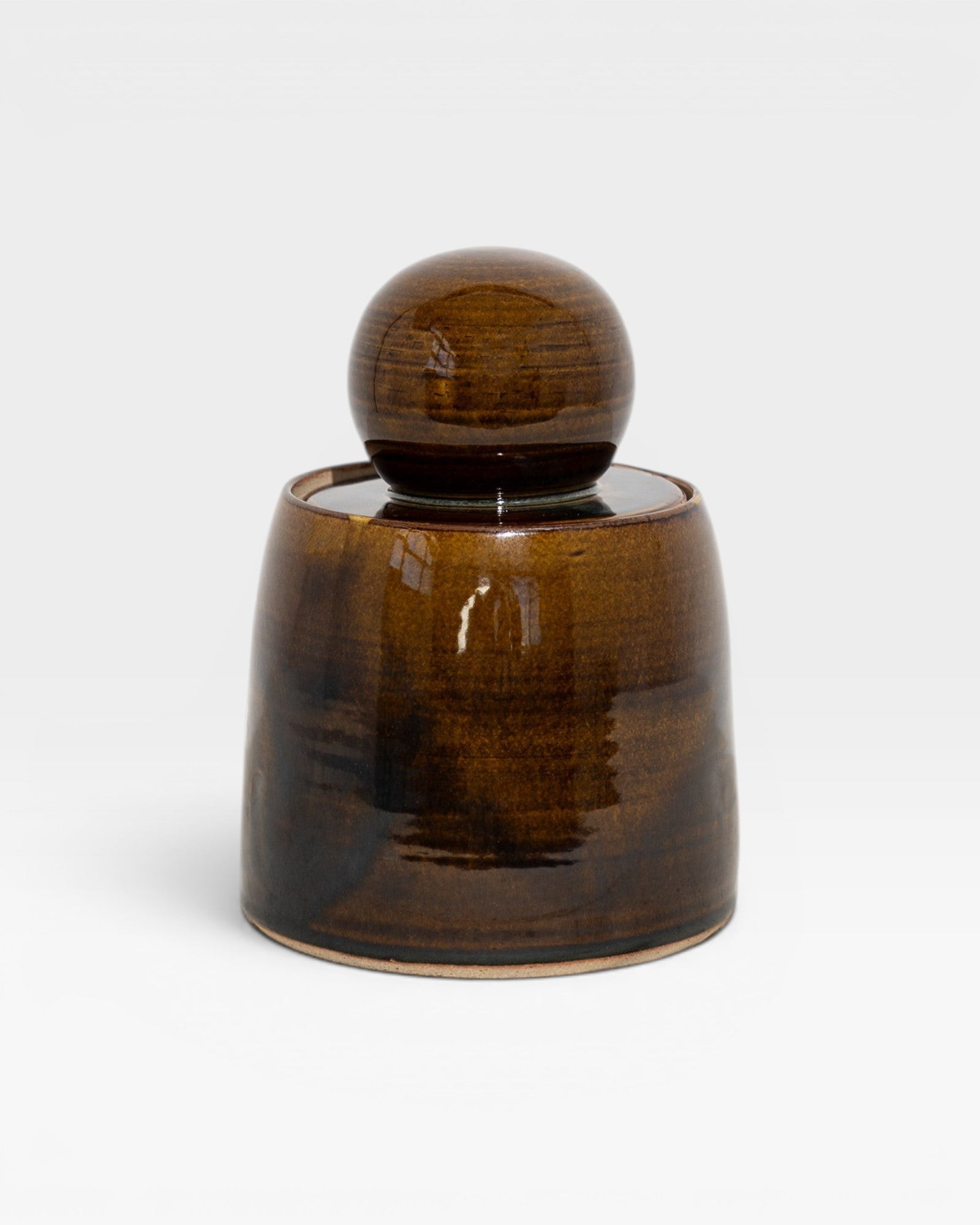 JONES + CO hand-thrown amber stoneware stash jar with chunky knob and satin glaze.