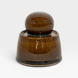 JONES + CO hand-thrown stoneware stash jar with chunky knob, in deep olive green and brown satin glaze.