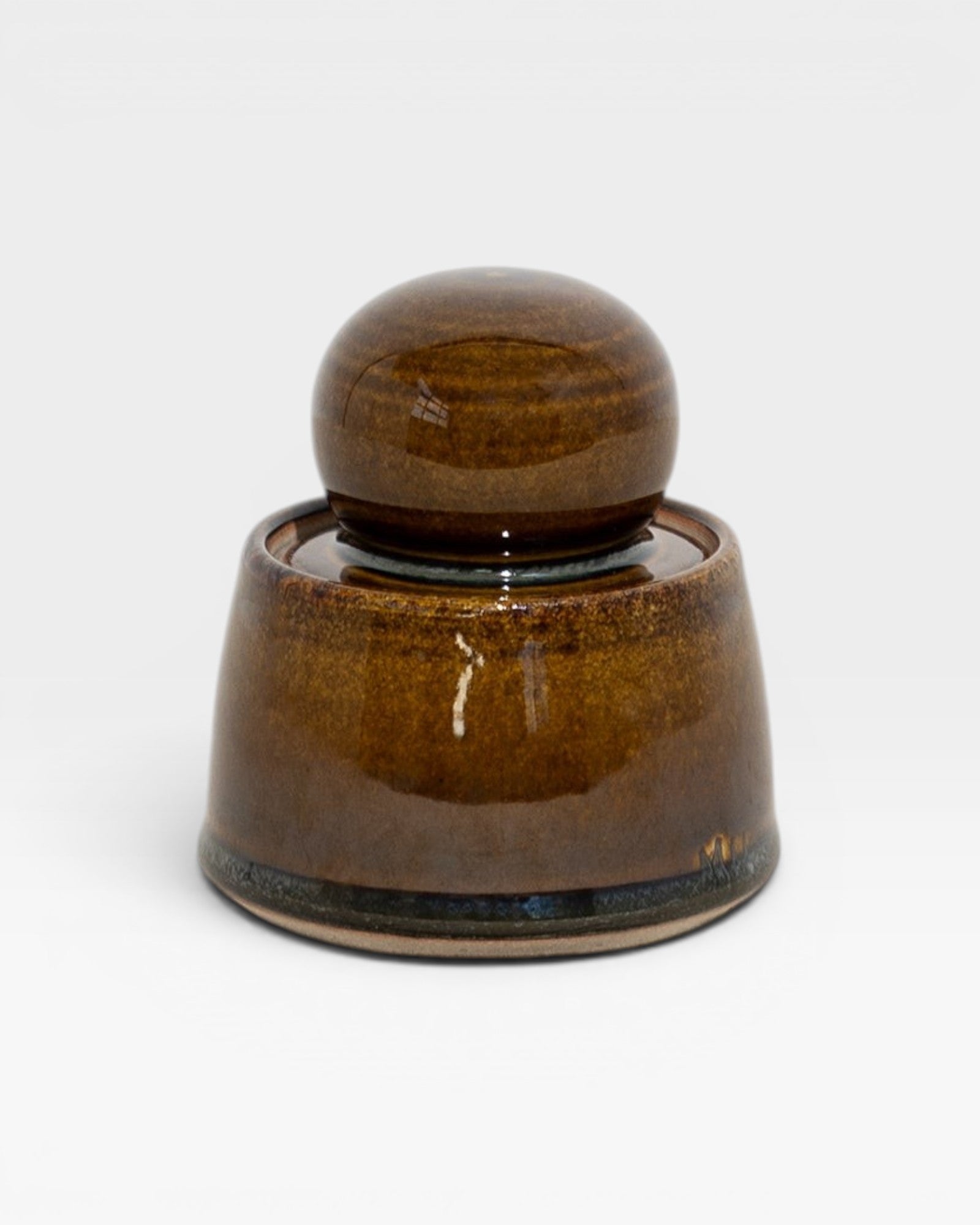 JONES + CO hand-thrown stoneware stash jar with chunky knob, in deep olive green and brown satin glaze.