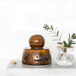 JONES + CO amber stoneware stash jar with chunky knob and satin glaze, hand-thrown in Los Angeles.