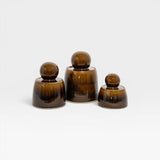 JONES + CO hand-thrown stoneware stash jars in amber with chunky knobs and satin glaze. Set of 3.