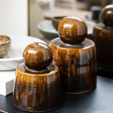 JONES + CO hand-thrown amber stoneware stash jar with chunky knob and satin glaze.