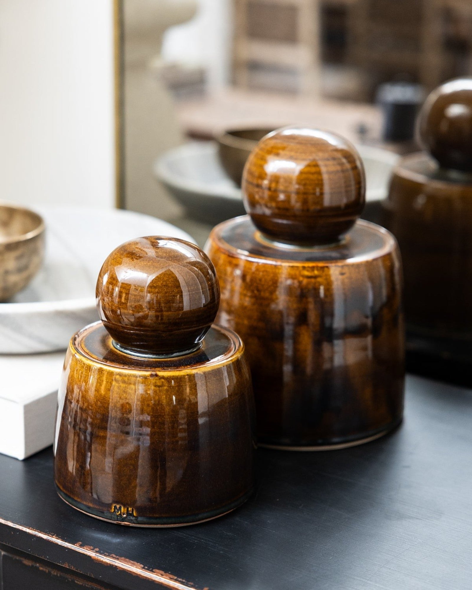 JONES + CO hand-thrown amber stoneware stash jar with chunky knob and satin glaze.