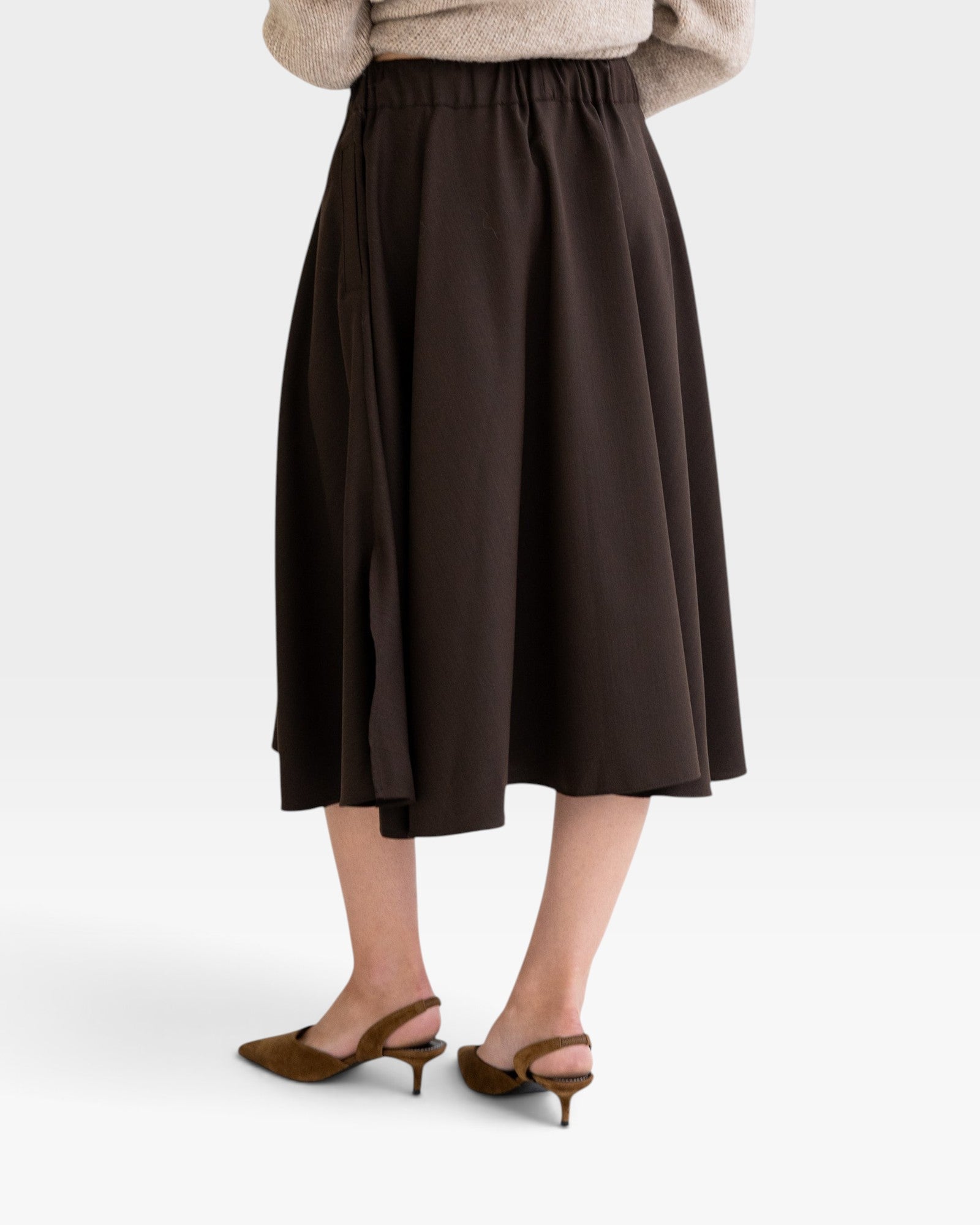 JONES + CO Angie skirt in chocolate brown with an elastic drawstring waistband and side slits, back view