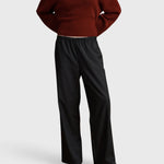 JONES + CO Joanna wool trousers in anthracite with a relaxed wide-leg fit and slim elastic waistband.
