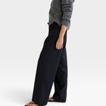 JONES + CO Joanna wool trousers in anthracite with a relaxed wide-leg fit and elastic waistband on a model