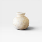 JONES + CO antique clay water pot with a rounded silhouette and weathered patina, neutral tones, 12" H x 10" W