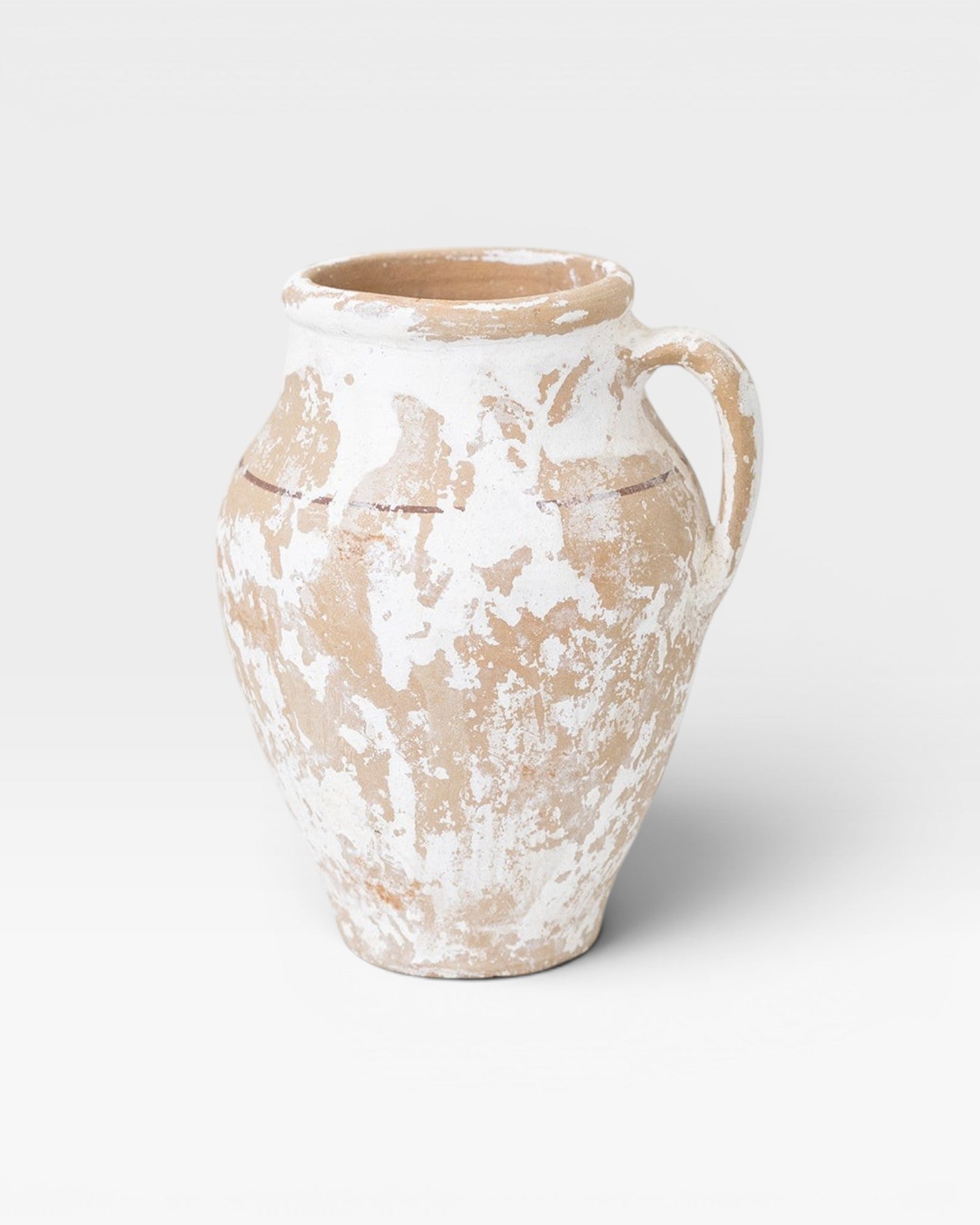 JONES + CO antique Turkish ceramic olive oil pot with aged patina, distressed white and tan finish.