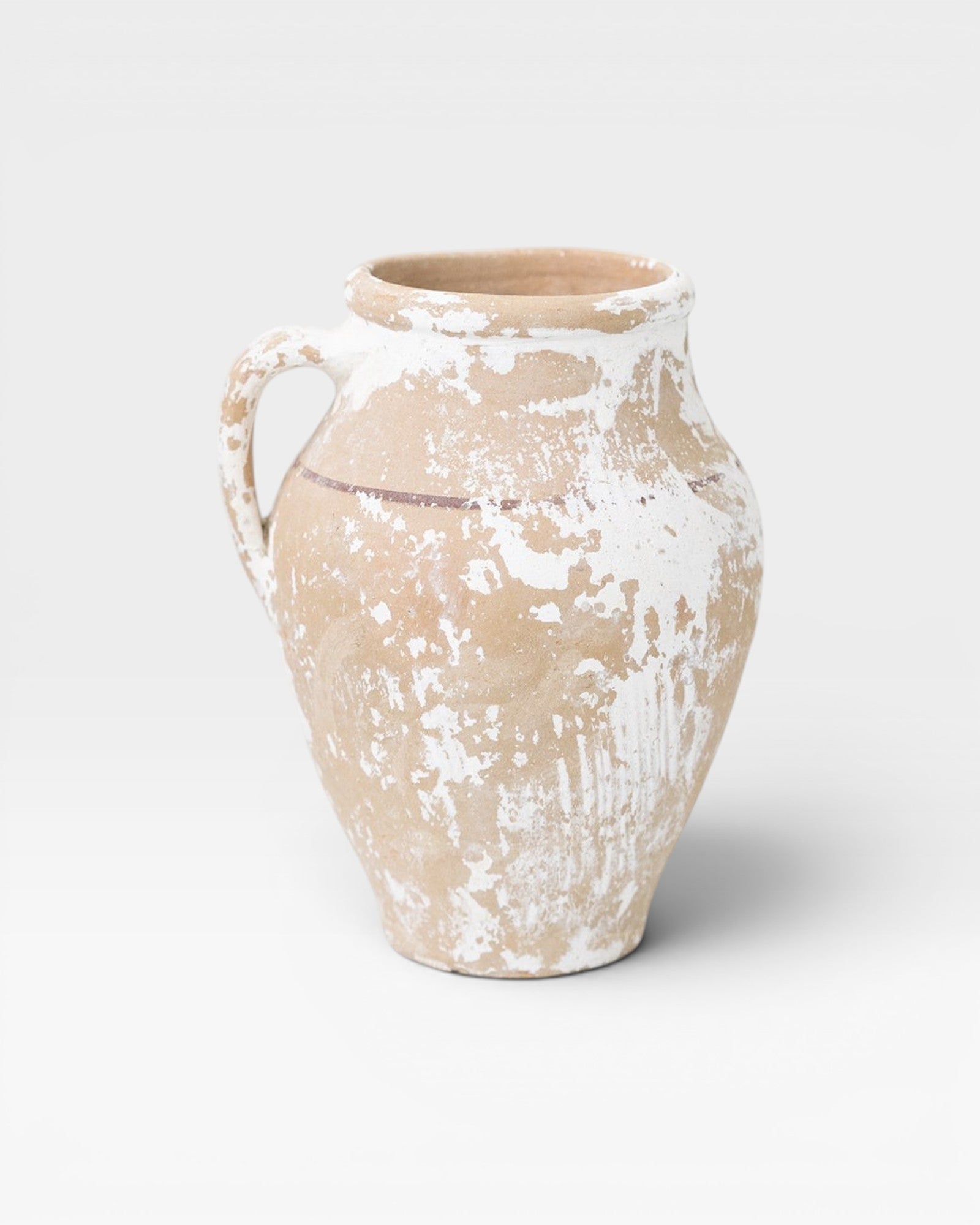 Antique JONES + CO Turkish ceramic olive oil pot with aged patina and distressed white finish.