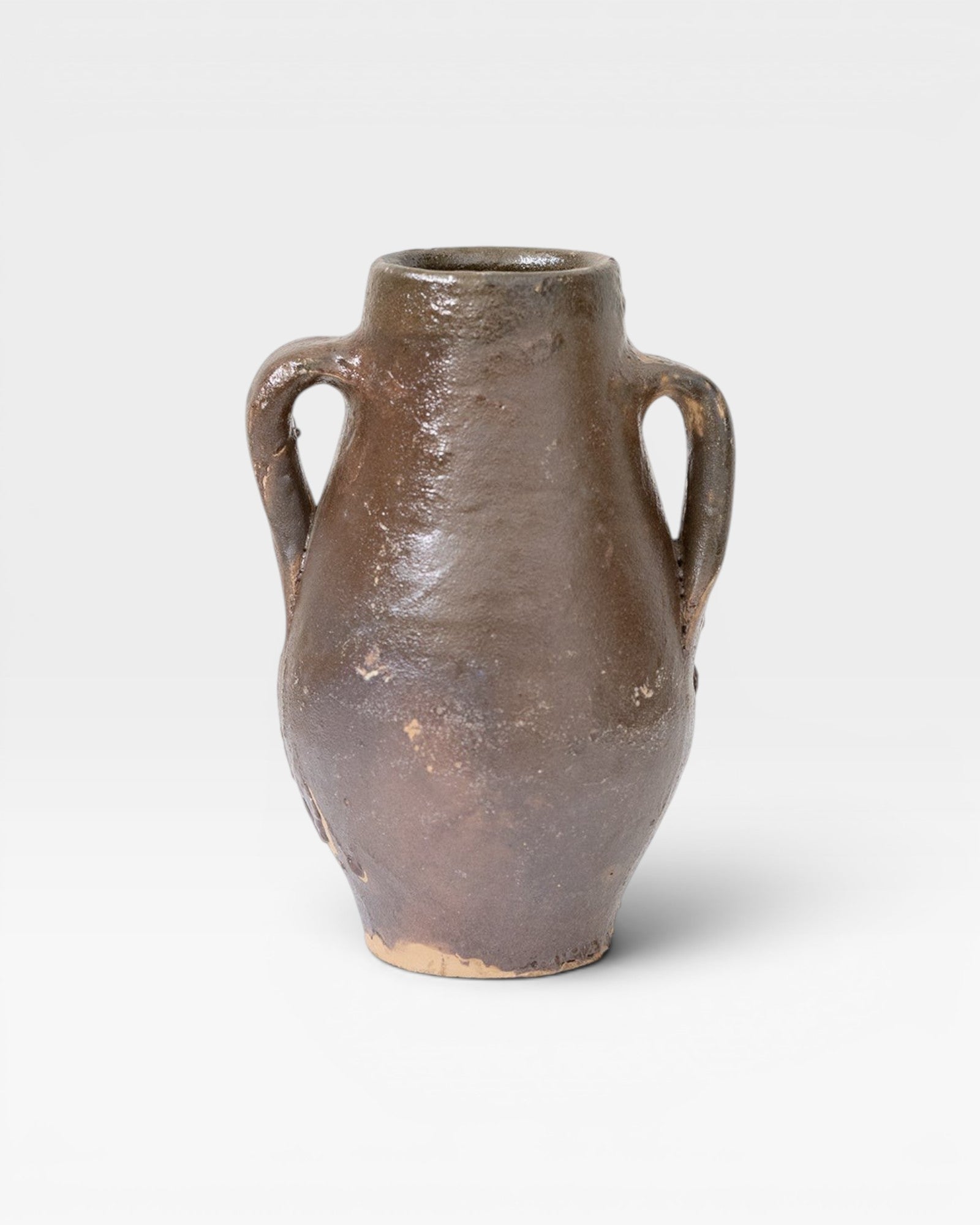 JONES + CO antique Turkish ceramic olive oil pot with aged patina and two handles. Brown glaze.