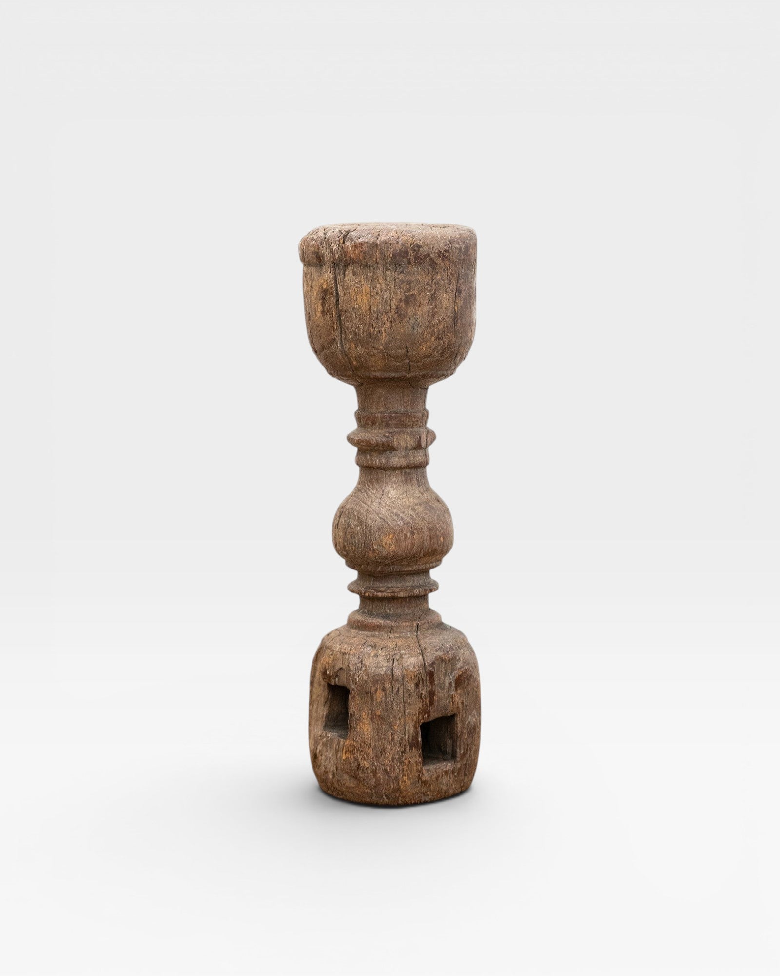 JONES + CO antique carved wooden pillar with weathered patina, rustic charm, and square cutouts at base.