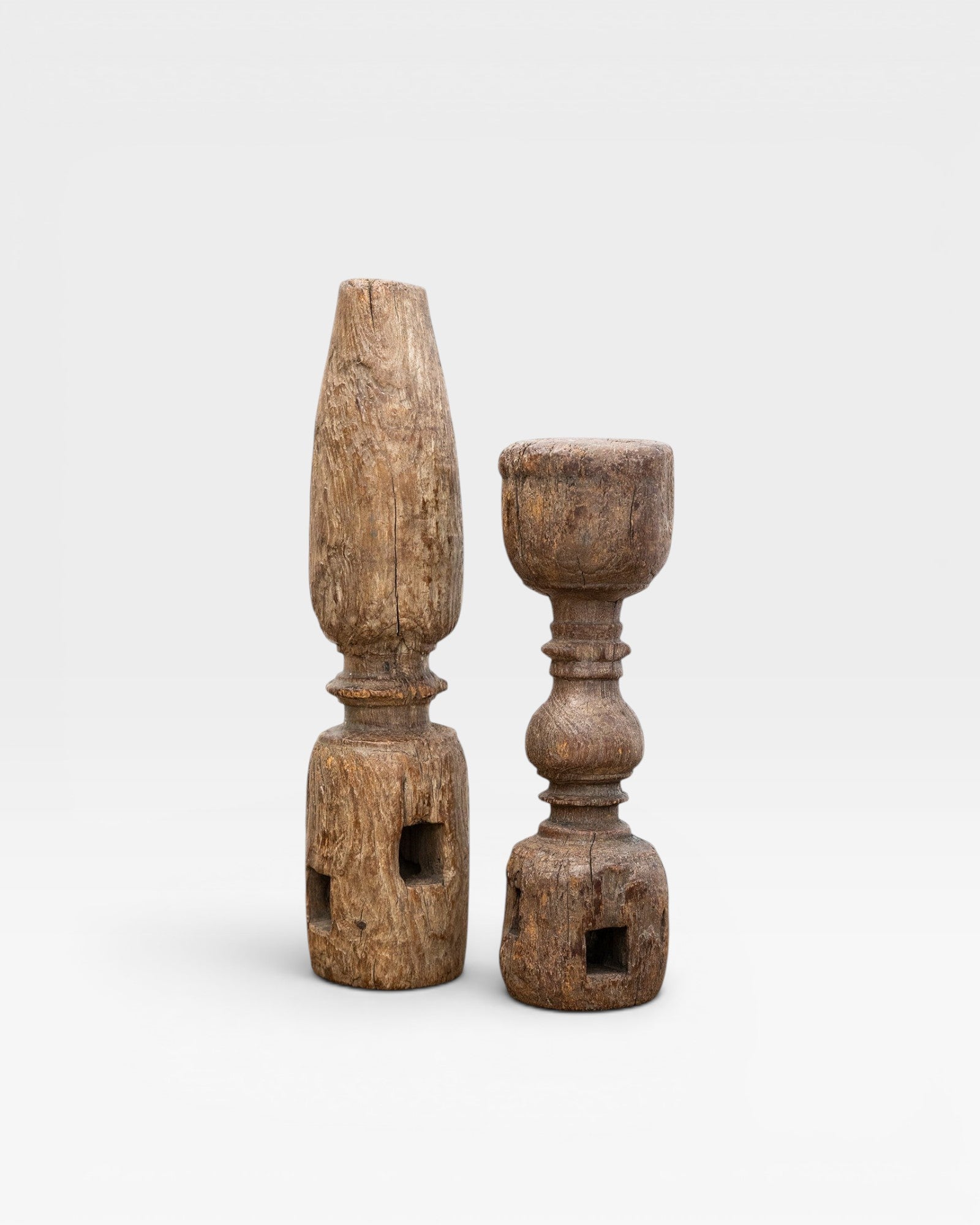 JONES + CO set of 2 antique carved wooden architectural pillars with weathered patina and rustic charm.