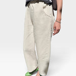 JONES + CO Arc pants in naturel heavy-weight canvas with a high elastic waist, curved leg, and deep side pockets.