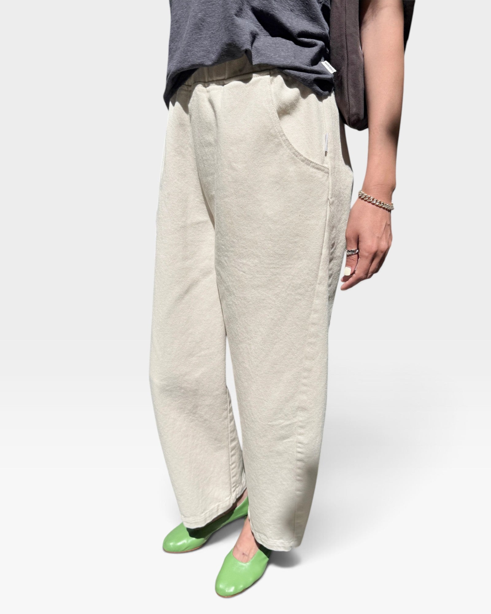 JONES + CO Arc pants in naturel heavy-weight canvas with a high elastic waist, curved leg, and deep side pockets.