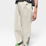 JONES + CO Arc pants in naturel heavy-weight canvas with a high elastic waist, curved leg, and deep side pockets.