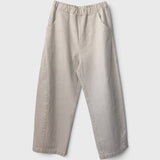 JONES + CO Arc pants in naturel heavy-weight canvas with an elastic high waist, curved leg, and side pockets.
