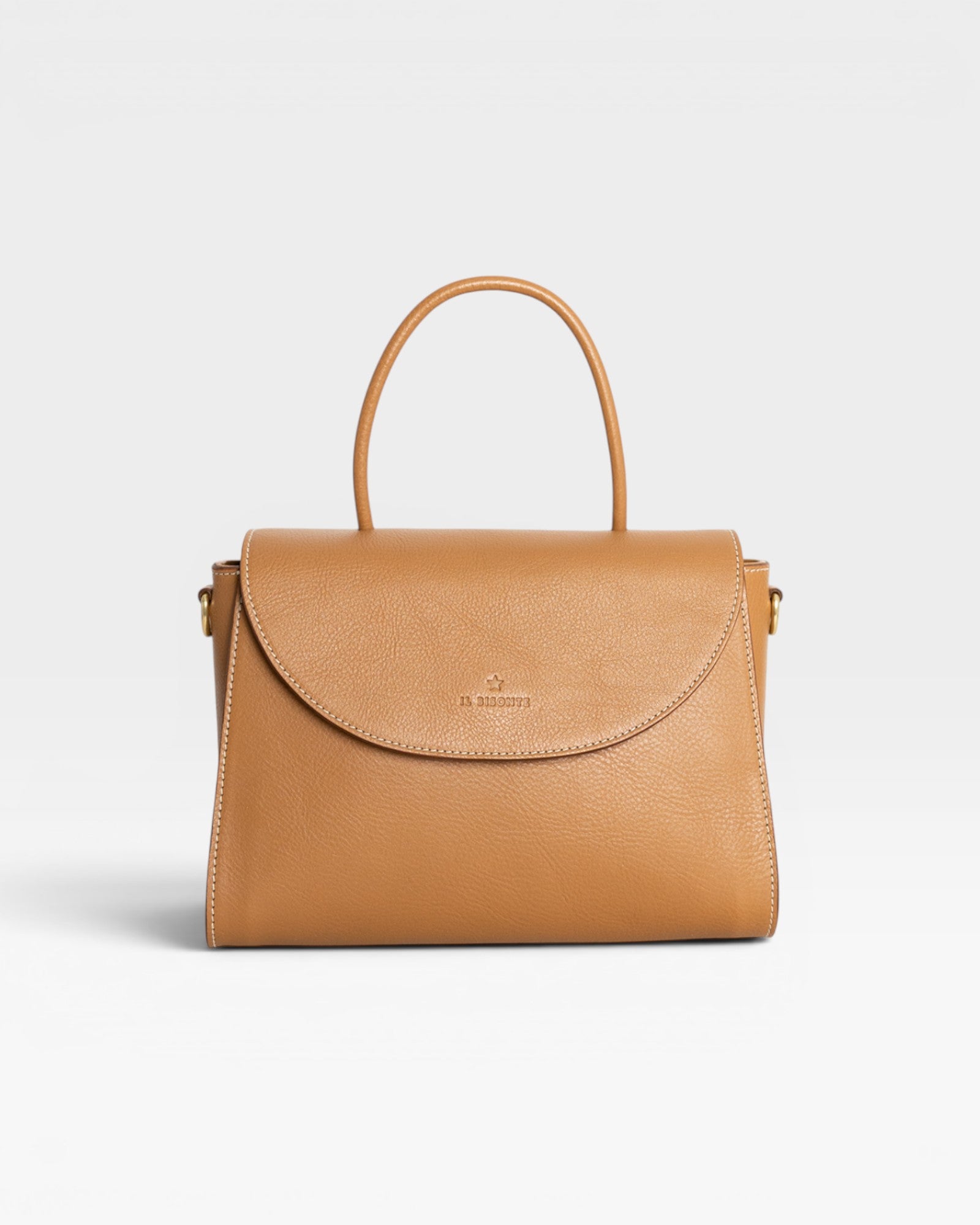 JONES + CO Archive 1978 Linea Top Handle Bag in Gianduia brown vegetable-tanned leather with rounded flap and white stitching.