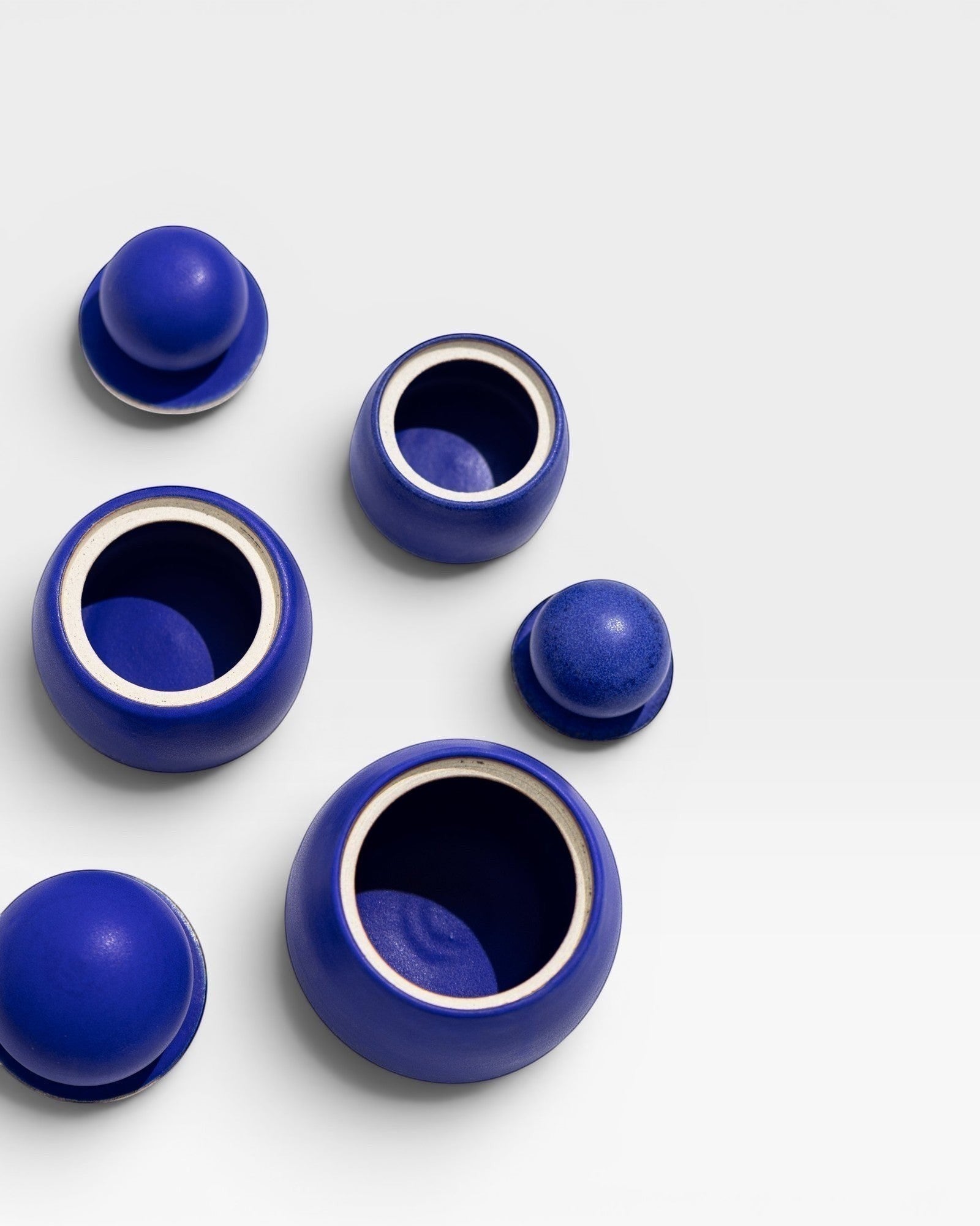 JONES + CO Azul electric blue stoneware stash jars with sculptural knobs, handmade in Los Angeles.