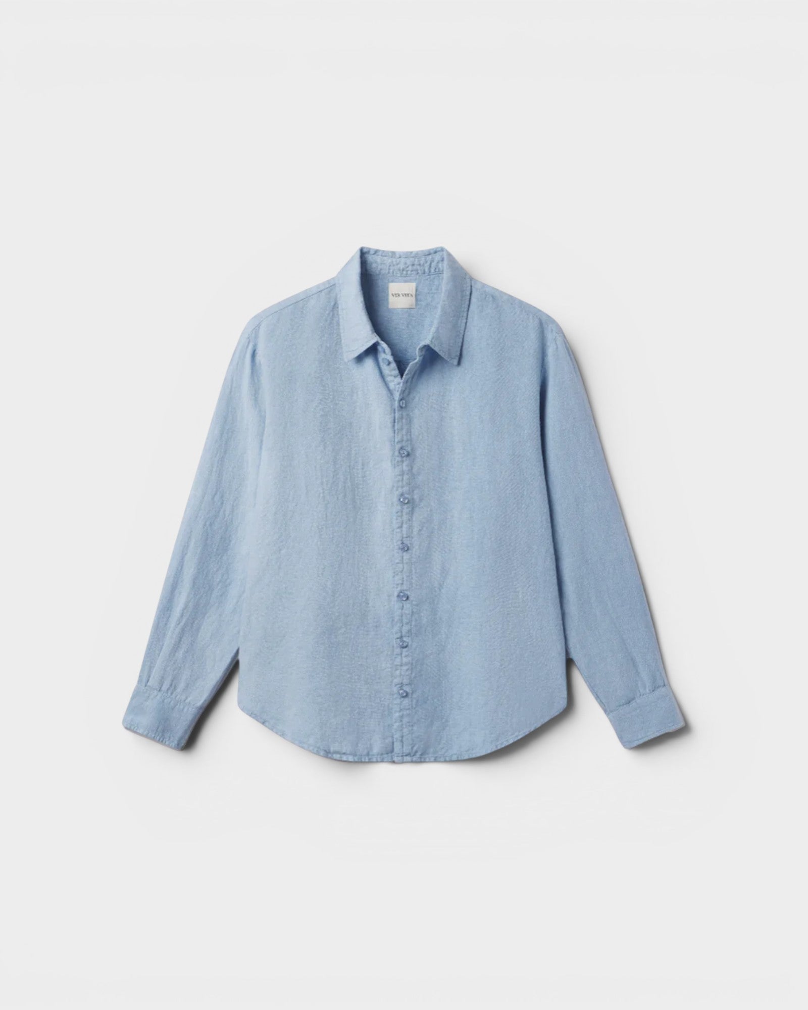 JONES + CO baby blue oversized linen shirt with button-down front and collar.