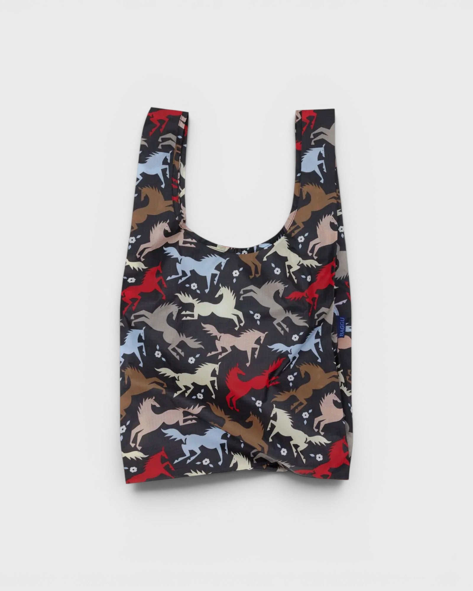 JONES + CO Baggu reusable grocery bag in black ripstop nylon featuring a colorful horse pattern.