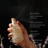 JONES + CO Balancing Mist facial spray in frosted bottle, misting in air. Antioxidant-rich.