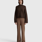 JONES + CO Bettina cashmere mock-neck sweater in oak brown with balloon sleeves worn with matching knit trousers