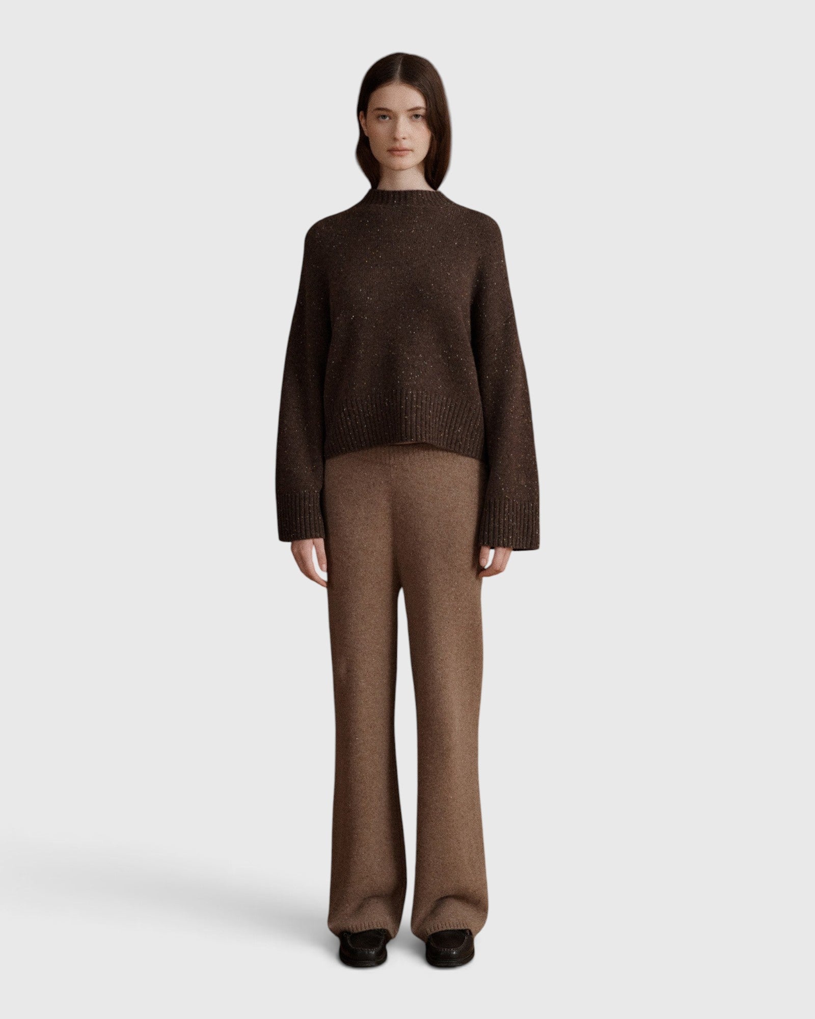 JONES + CO Bettina cashmere mock-neck sweater in oak brown with balloon sleeves worn with matching knit trousers