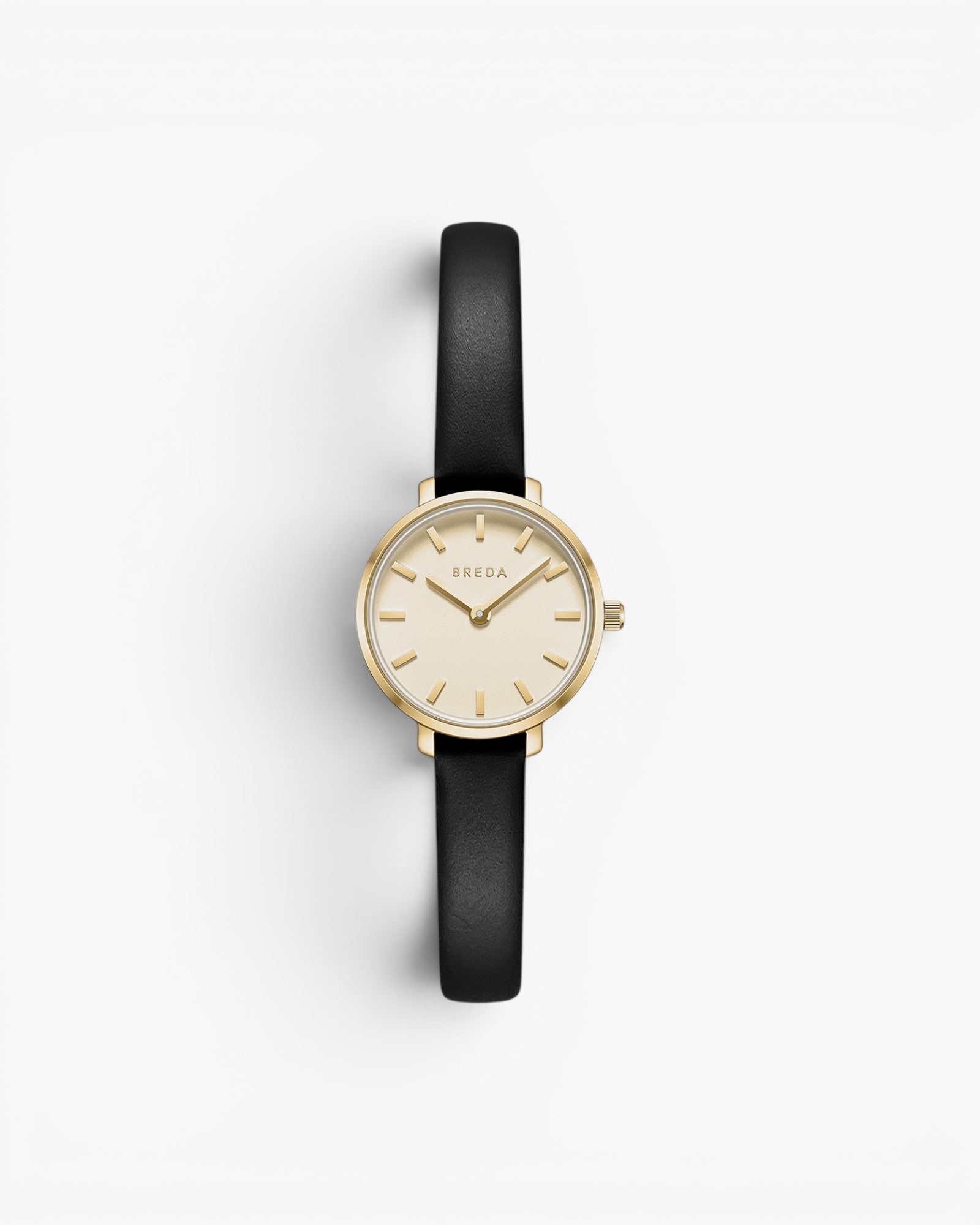 JONES + CO Beverly watch featuring a gold case, minimalist cream dial, and black leather strap on a white background.