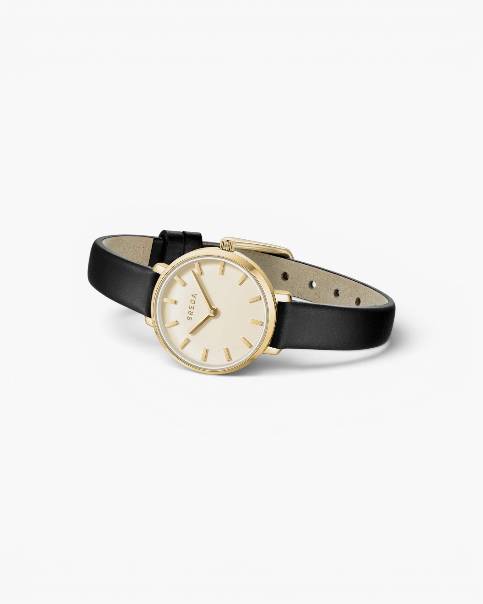 JONES + CO Beverly watch with a gold case, minimalist cream dial, and black leather strap on a white background.