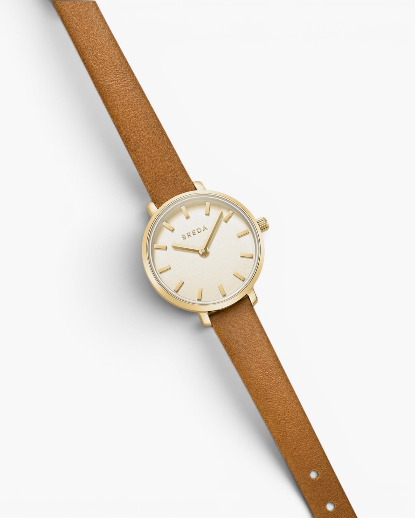 JONES + CO Beverly watch featuring a gold case, cream dial, and brown leather strap on a white background