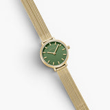JONES + CO Beverly mesh watch featuring a round gold case and a vibrant green dial with gold indices.