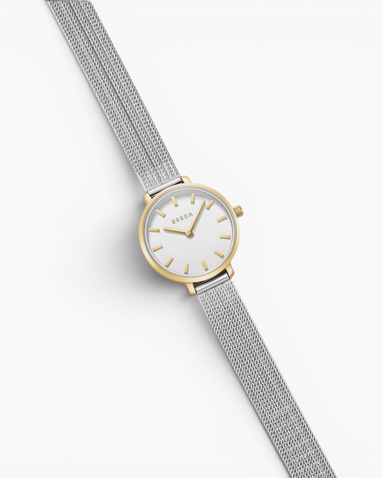 JONES + CO Beverly mesh watch featuring a silver stainless steel strap and a round gold-tone case with a white dial.