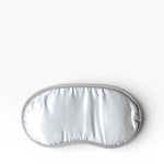 JONES + CO Morihata Binchotan Charcoal Eye Mask in silver satin with grey trim, ideal for relaxation and sleep.