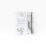 JONES + CO Binchotan Charcoal Facial Puff, made from konjac root and charcoal powder for gentle exfoliation and cleansing.