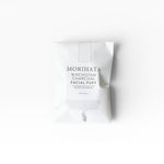 JONES + CO Binchotan Charcoal Facial Puff, made from konjac root and charcoal powder for gentle exfoliation and brighter skin.