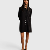 Model wearing a JONES + CO black cotton poplin shirt dress with a button-front design against a neutral backdrop.