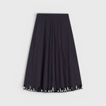 JONES + CO black midi skirt with a flared silhouette and intricate cut-out embroidery along the hem.