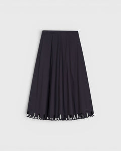 JONES + CO black midi skirt with a flared silhouette and intricate cut-out embroidery along the hem.